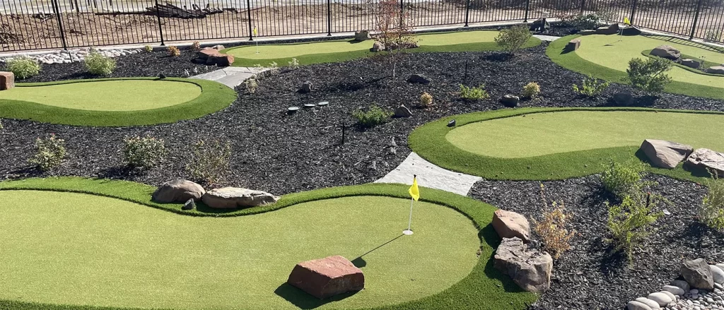 Professional putting green design by turf installation experts, creating a challenging and enjoyable golfing area for enthusiasts.